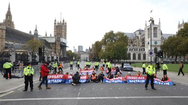 Protesters from Insulate Britain block the road in Parliament Square, central London. Picture date: Thursday November 4, 2021.  